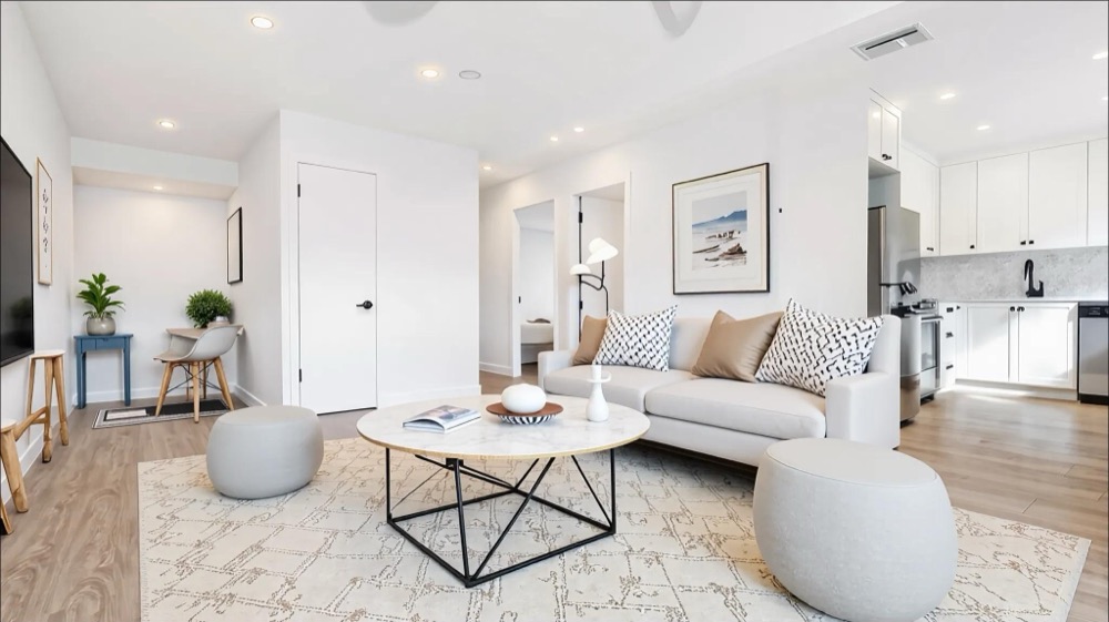 Renovated open-concept living room at Domaine Pelican